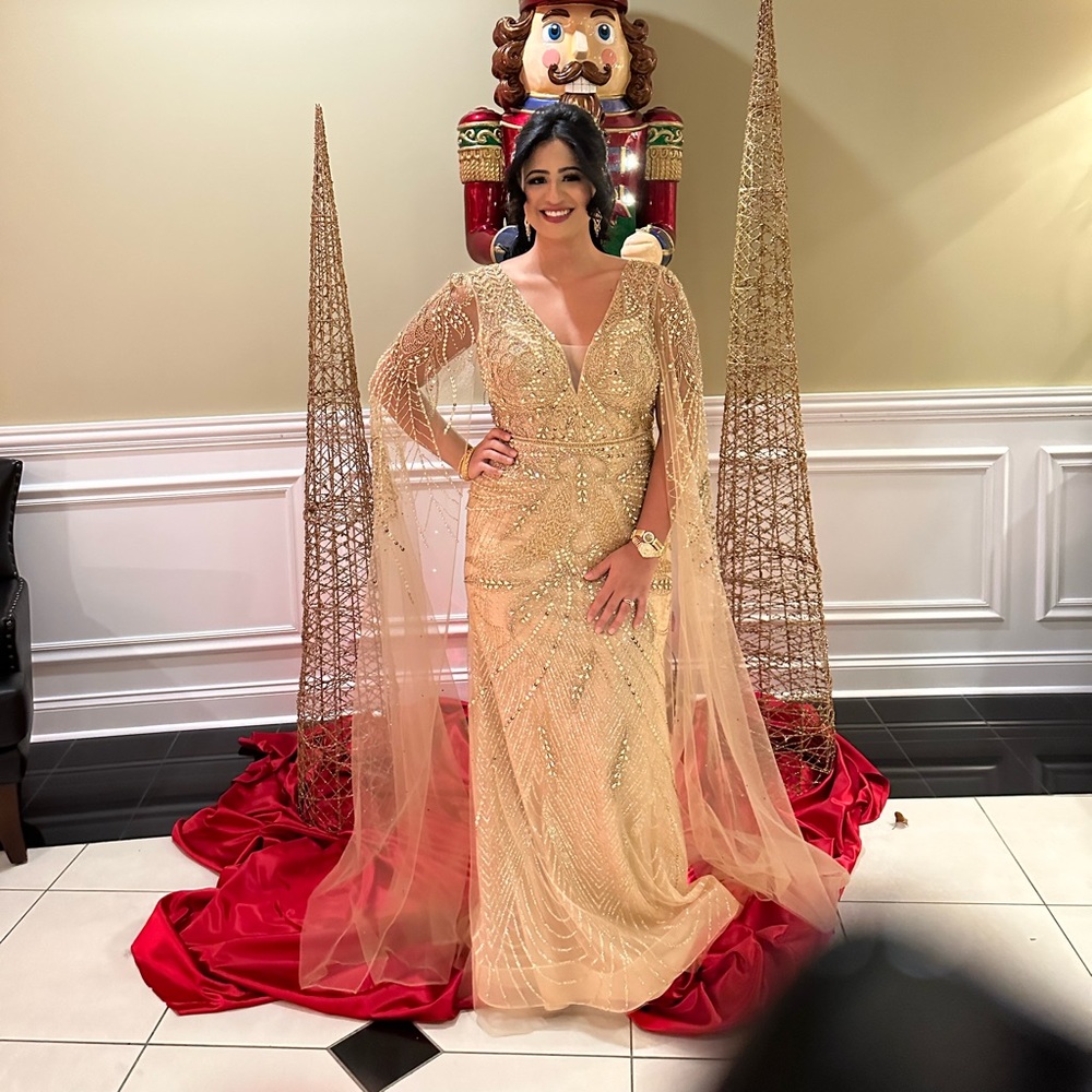 Gold dress with cape sleeves